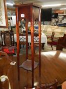 A 1930's oak plant stand. COLLECT ONLY.