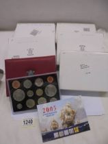 Six boxed de-luxe proof coin sets in cases and with booklets etc.,