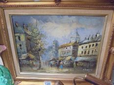 A gilt framed oil on board continental street scene, signed. COLLECT ONLY.