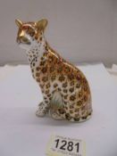 A Royal Crown Derby Leopardess with gold stopper.
