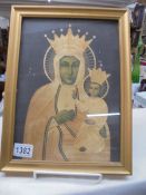 A framed and glazed study of the Madonna and child.