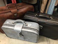 Three suitcases. Various sizes