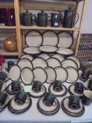 In excess of sixty pieces of rare Denby Mercury pattern tea and dinnerware, COLLECT ONLY.