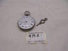 A silver pocket watch marked fine silver, S S & C C, 38519, E Crouch, North Brixton, working order