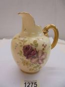 A Royal Worcester hand painted jug, Rd. NO. 29115
