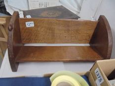 An oak Mouseman book shelf.
