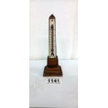 A Mauchlin ware obelisk thermometer with four scenes of Bath.