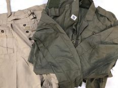 Flight suit and pair of tan coloured shorts
