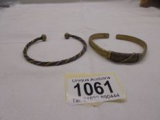 Two old slave bracelets.