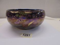 A Malings, Newcastle on Tyne lustre bowl depicting peacocks. 20 cm diameter.