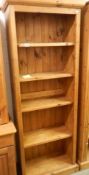 A modern pine four shelf bookcase, 189 x 32 x 71 cm. COLLECT ONLY.