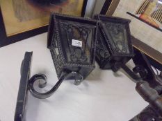 A pair of wrought iron wall lights, COLLECT ONLY.