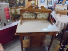 An Edwardian oak tiled back washstand, COLLECT ONLY,