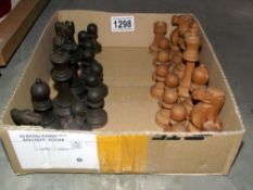 A vintage weighted wooden chess set (missing one white pawn).