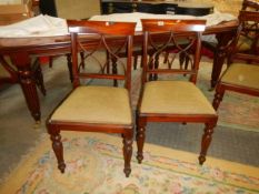 A good quality Victorian style dining table and eight chairs,. COLLECT ONLY.