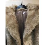 Sheepskin / fur coat. Styled by Tona