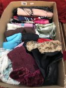 A quantity of scarves and gloves