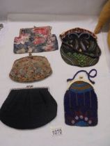 Five early purses including two beaded examples.