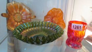 Four pieces of carnival glass.
