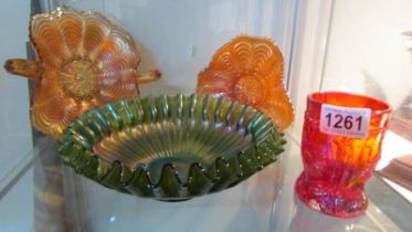 Four pieces of carnival glass.
