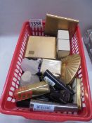 A mixed lot of compacts, lighters etc.,