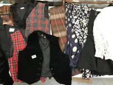 A large quantity of ladies clothing including skirts, shirts and waistcoats