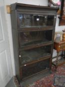 A Globe Werneke four section bookcase with spare door