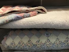2 large bed throws. 1x patchwork with 2 pillowcase and 1x cream