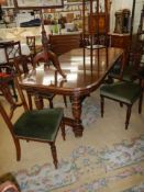 A French extending dining table with two leaves and a set of six chairs, COLLECT ONLY.