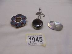 An unusual stone set brooch, a mother of pearl brooch and a stone set pendant on chain.