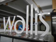 An Acrylic 'Wallis' shop display sign, COLLECT ONLY.