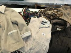 collection of ladies coats. Various sizes