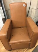 Small child's leather tan chair. In need of repair