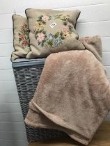 Grey Linen basket with 2 tapestry cushion and a brown throw