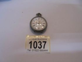 A silver stamped 800 enamel dial fob watch.