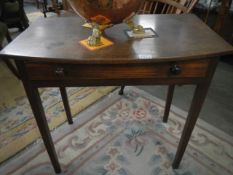 An Edwardian mahogany side table on tapered legs and with single drawer, COLLECT ONLY.
