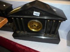 A heavy black slate paladian style mantel clock, A/F. COLLECT ONLY.