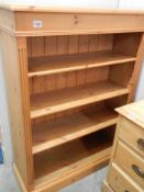 A 20C pine four shelf bookcase with adjustable shelves, 122 cm tall, 90 cm wide, 34 cm deep, COLLECT