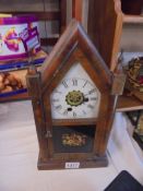 A good wooden mantel clock.