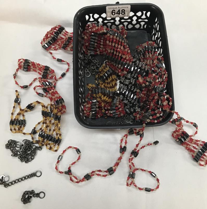 A basket with magnetic jewellery and attachments