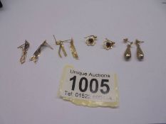 A quantity of 9ct gold earrings (four pairs), 3.06 grams.