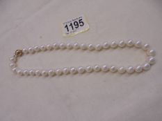 Cultured pearl strung necklace with a 9ct yellow gold ball clasp