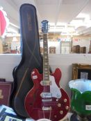 A six string Epiphone electric guitar, red design with Ritter case and Blackstar amp. COLLECT ONLY.