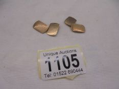 A pair of 9ct gold cuff links, 3.2 grams.