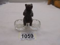 A Black Forest bear on glass salts.