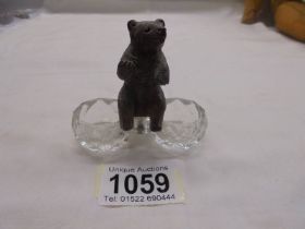 A Black Forest bear on glass salts.