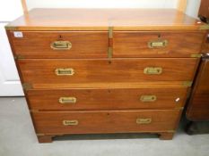 A brass bounded mahogany campaign/captain's chest on bracket feet and in two pieces for transport