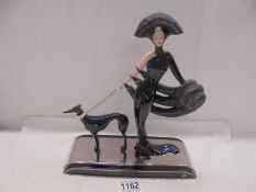 A boxed Franklin Mint Art Deco style Erte figurine - Symphony in Black.