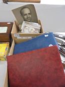 A good lot of old postcards, photographs and first day covers in two boxes and two albums.