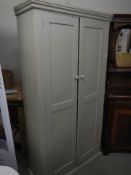 A tall two door painted cupboard, COLLECT ONLY.